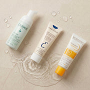 FrenchFormulas French Starter Routine bundle with skincare products, featuring cleansers, moisturizers, and serums in elegant packaging.