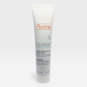 Avène Cicalfate+ Repairing Protective Cream serum in a 100ml bottle, showcasing the skincare product's packaging and branding.
