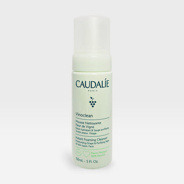 Caudalie Instant Foaming Vine Flower Cleanser in 50ml bottle, showing the foaming cleanser with floral ingredients and sleek packaging.