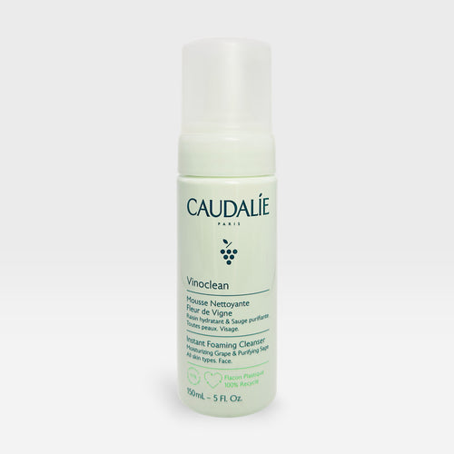 Caudalie Instant Foaming Vine Flower Cleanser in 50ml bottle, showing the foaming cleanser with floral ingredients and sleek packaging.