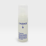 Caudalie Vinoperfect Micropeeling Mousse in a 100ml bottle, a gentle exfoliating mask for radiant skin, shown in a sleek container.