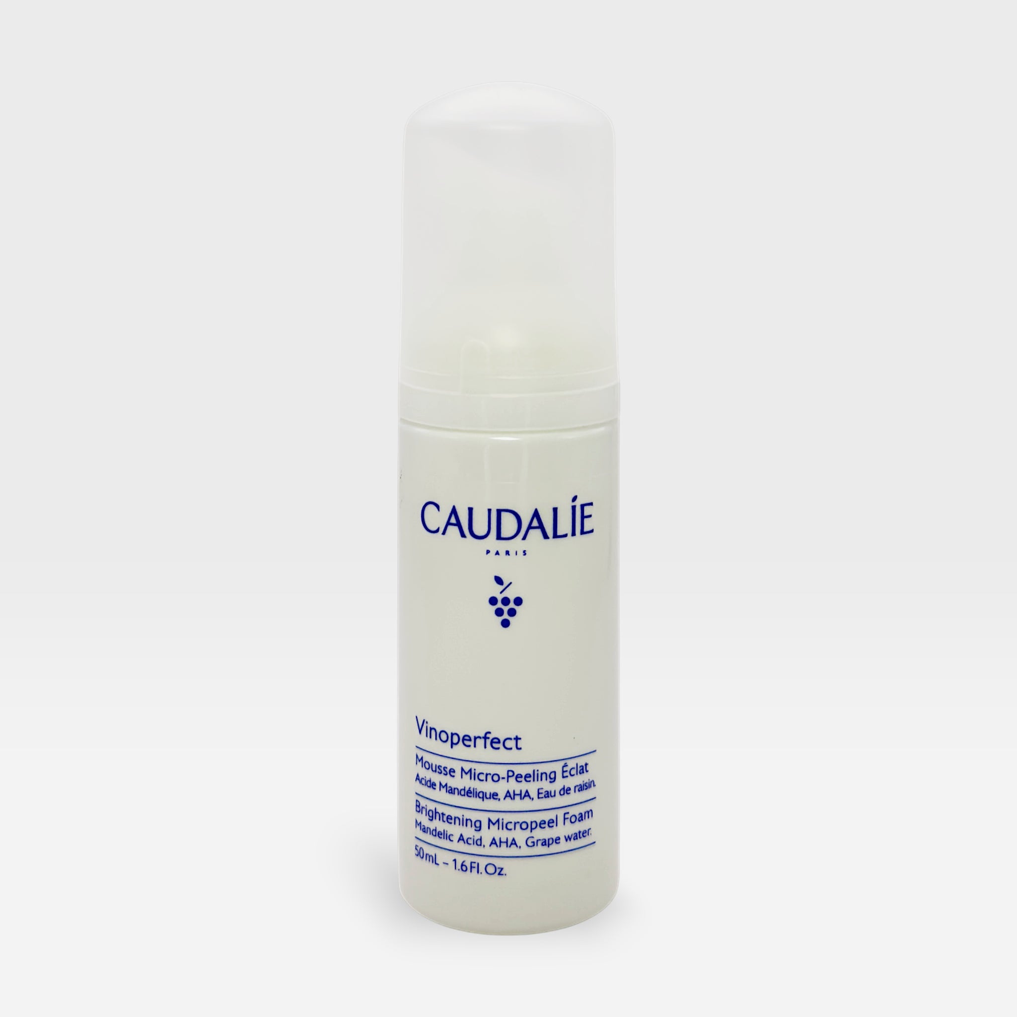 Caudalie Vinoperfect Micropeeling Mousse in a 100ml bottle, a gentle exfoliating mask for radiant skin, shown in a sleek container.