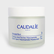 Caudalie Vinoperfect Brightening Cream in a 50ml jar, featuring a white and gold packaging, designed for instant skin brightening and hydration.
