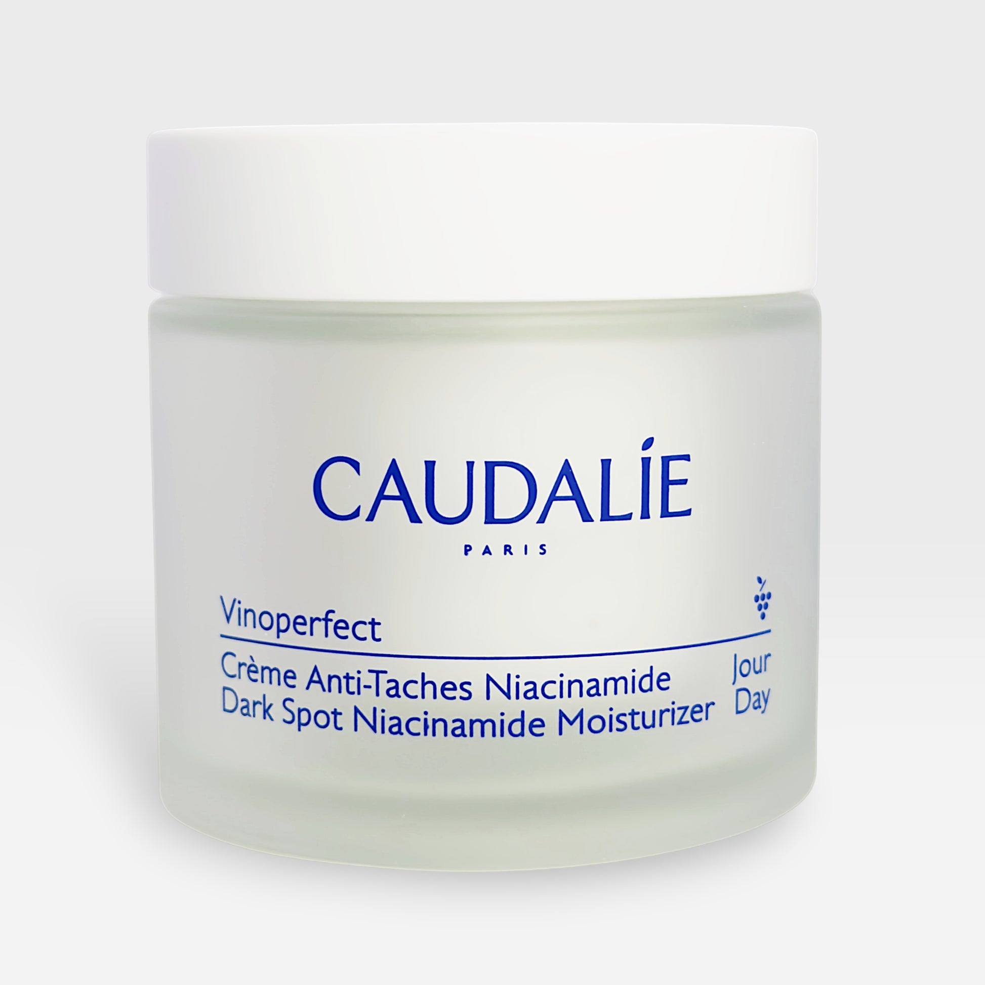 Caudalie Vinoperfect Brightening Cream in a 50ml jar, featuring a white and gold packaging, designed for instant skin brightening and hydration.