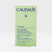 Caudalie Vinopure Blemish Control Salicylic Serum in a clear glass bottle with dropper for acne-prone skin treatment.