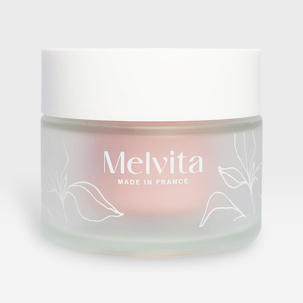 Melvita Source de Roses Hydra-Plumping Cream in a 50ml jar, featuring a pink floral design and smooth, creamy texture.