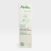 Melvita Organic Nigella Oil in a 50ml fluid bottle, showcasing the dark glass container with the oil inside.
