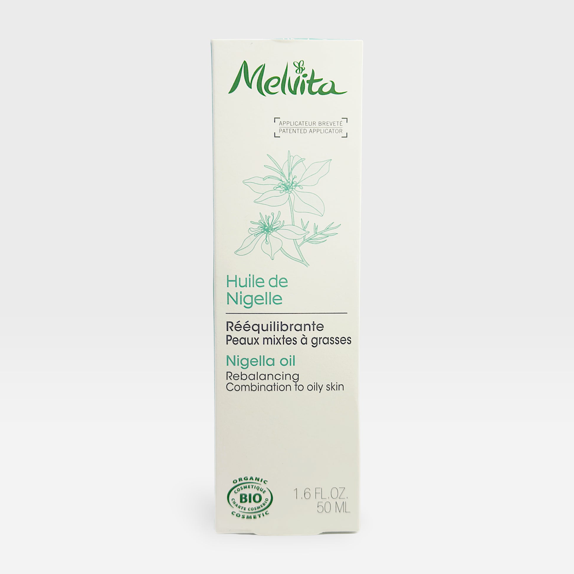 Melvita Organic Nigella Oil in a 50ml fluid bottle, showcasing the dark glass container with the oil inside.
