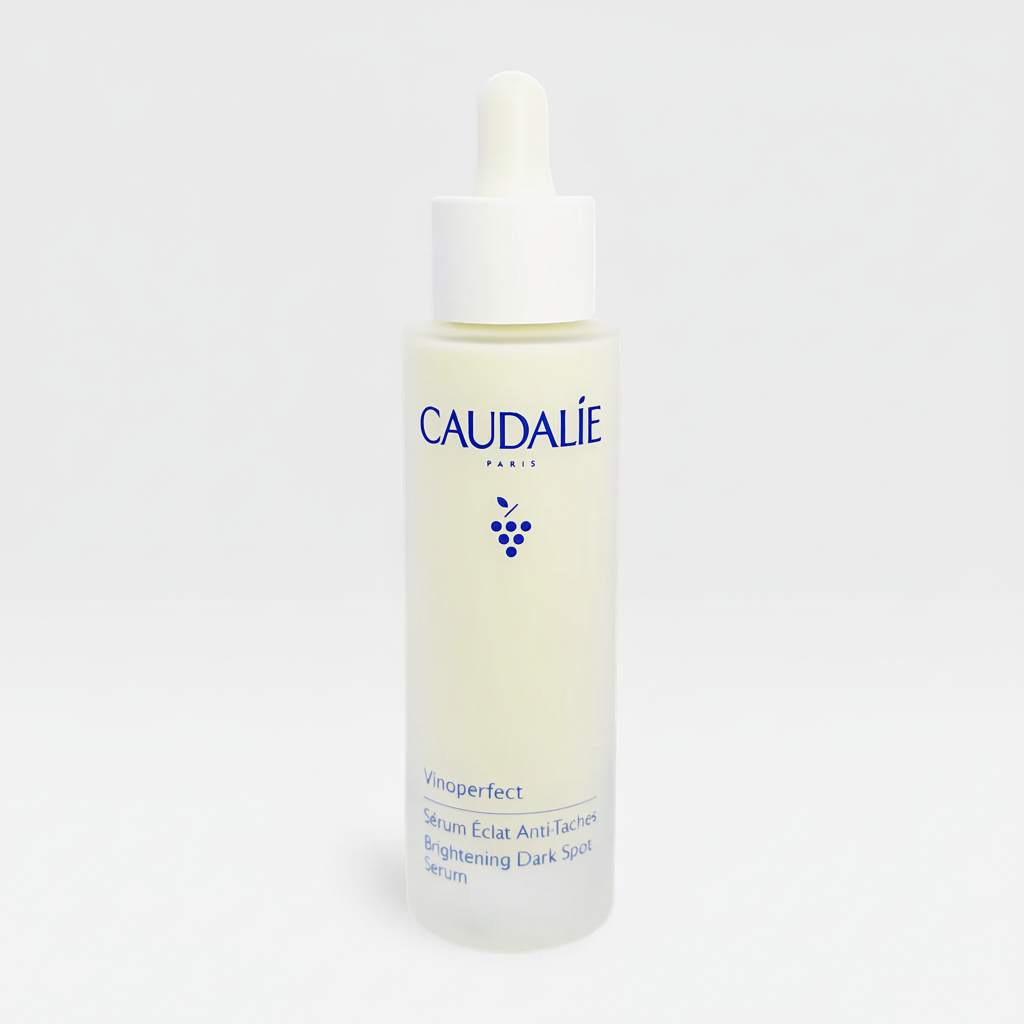 Caudalie Vinoperfect Radiance Serum in a 50ml bottle, featuring a clear glass container with a pump dispenser.