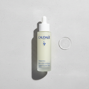 Caudalie Vinoperfect Radiance Serum bottle with a sleek 50ml design, featuring a pump dispenser and clean branding.