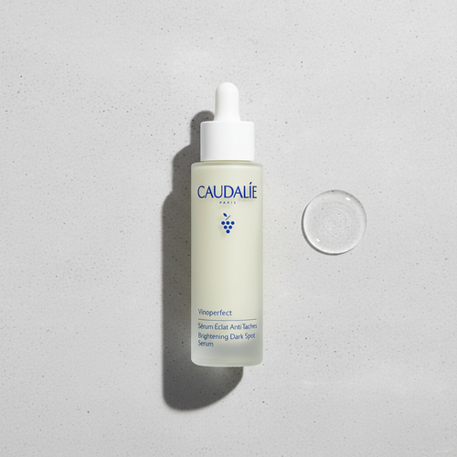 Caudalie Vinoperfect Radiance Serum bottle with a sleek 50ml design, featuring a pump dispenser and clean branding.