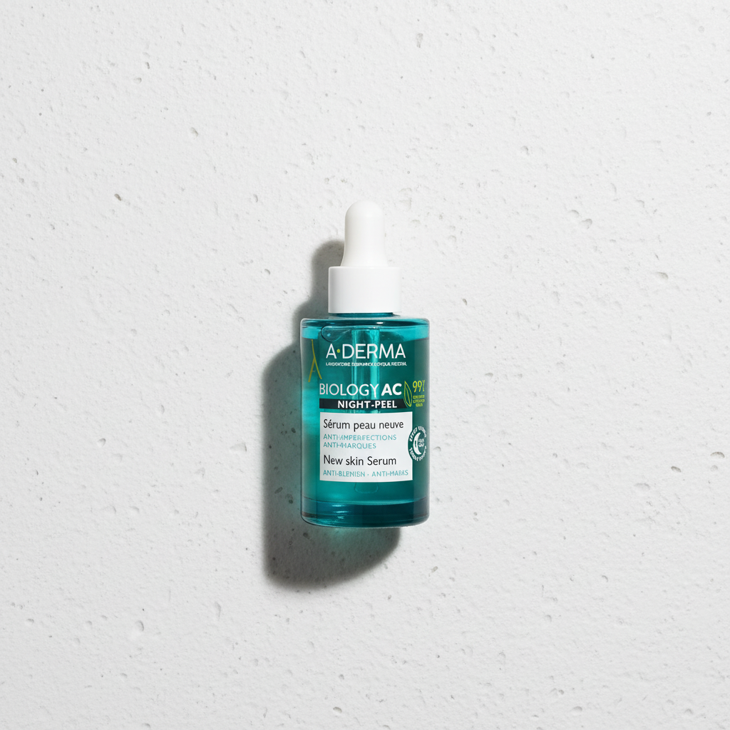 A-Derma Biology AC Night-Peel Serum in a 30ml bottle, showcasing the serum with a sleek design and pump dispenser.